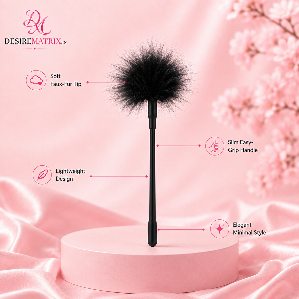 Feather tickler shown full length with soft black plumes