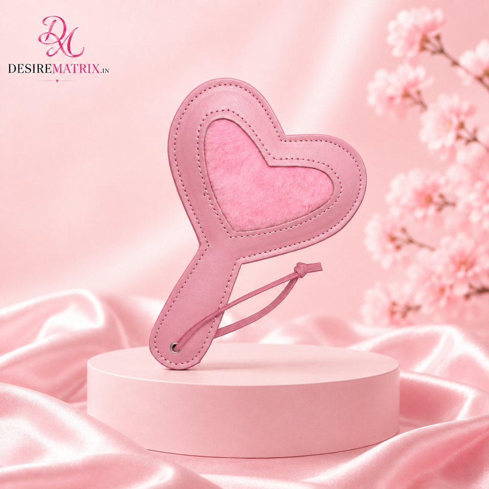 Pink heart-shaped spanking paddle, 18.5 cm long