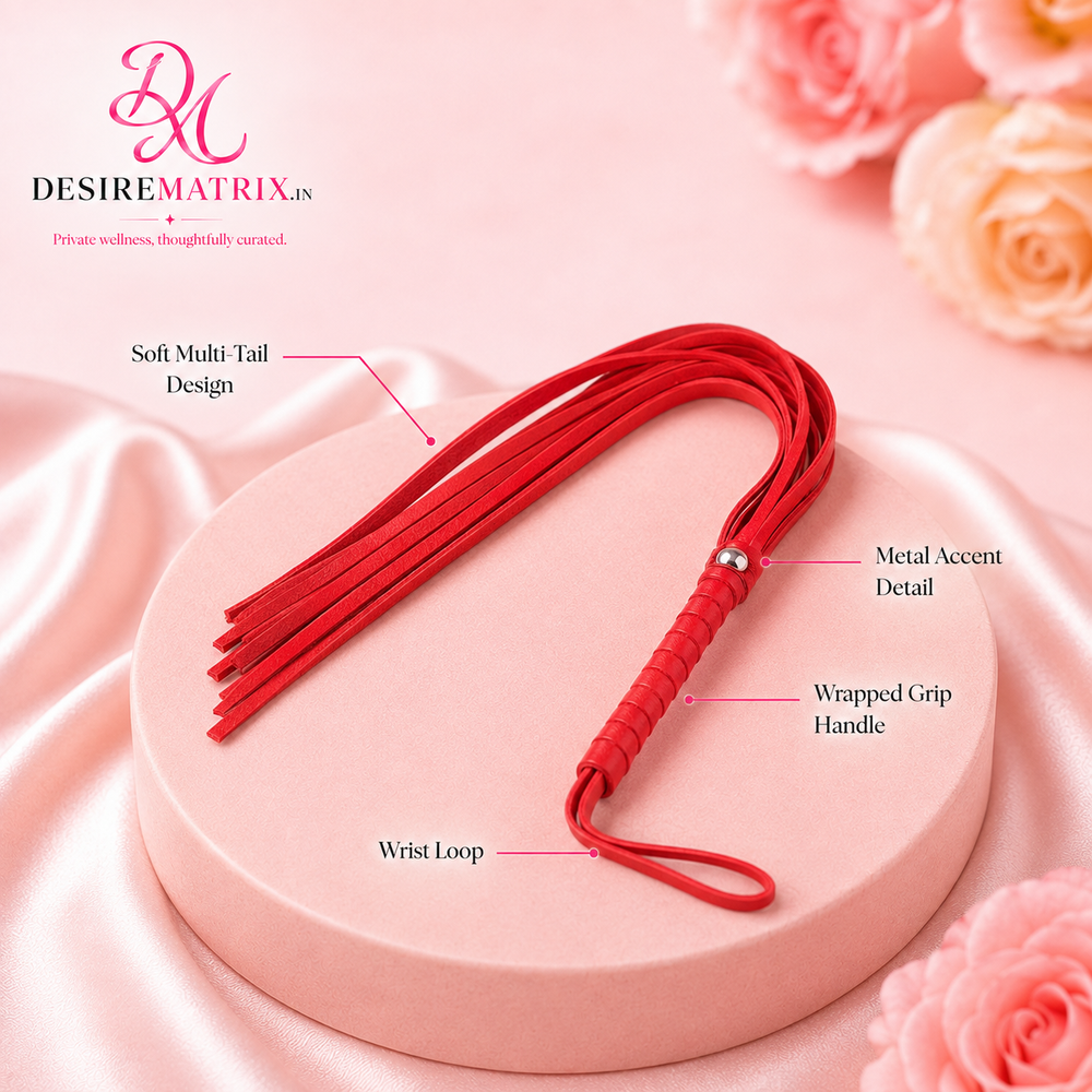 Red flogger shown full length with the tails spread